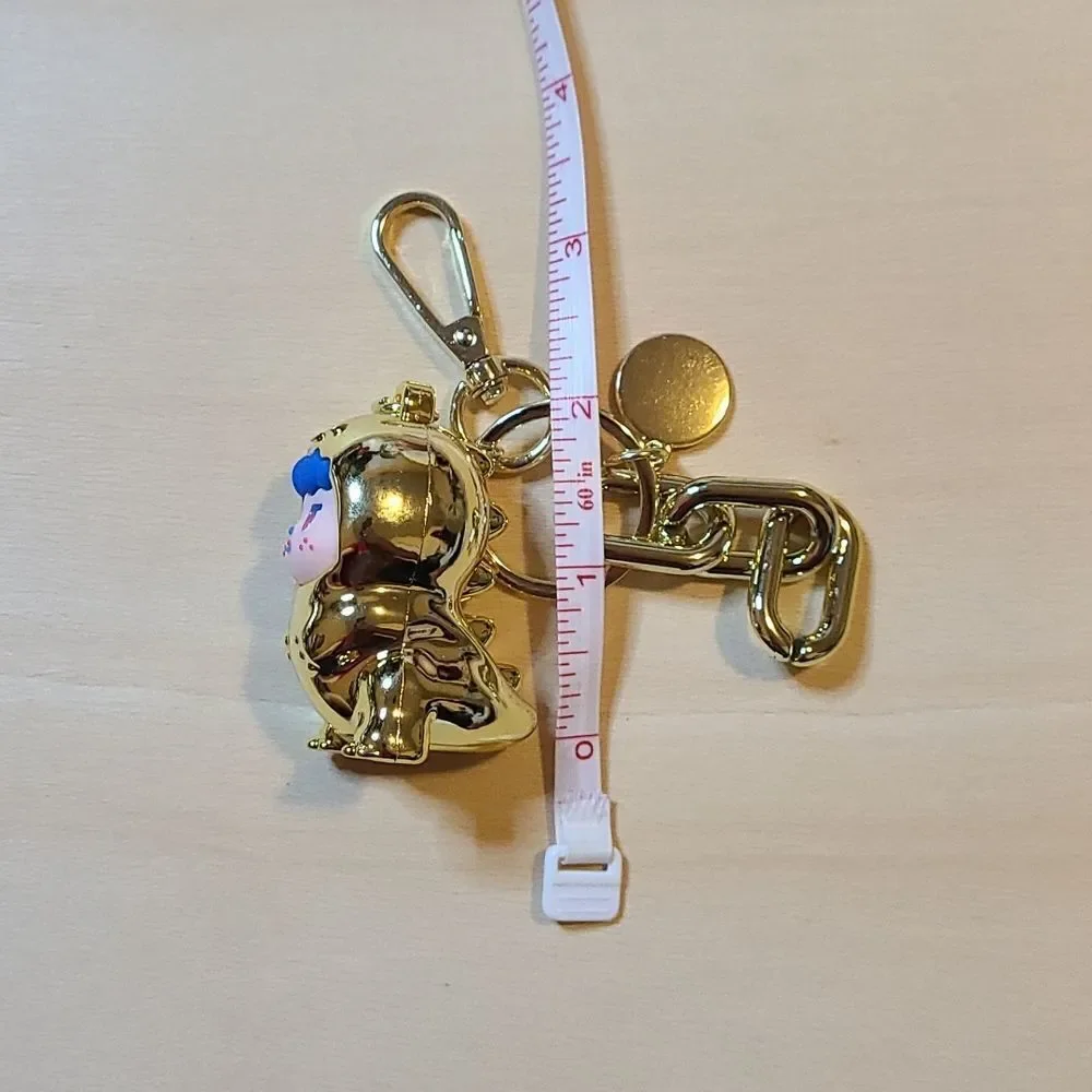 Tyrannosaurus gold pendant keychain